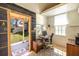 Well-lit office space featuring a work desk and a view to the backyard at 1516 Village Sq, Mount Pleasant, SC 29464