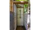 Rustic outdoor shower with wooden slats, adding a touch of nature at 1516 Village Sq, Mount Pleasant, SC 29464