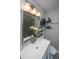 Updated bathroom with modern vanity, mirror and shower with glass doors at 152 Coming St St, Charleston, SC 29403