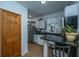 Functional kitchen with white cabinets, stainless steel appliances, and granite countertops, offering a practical cooking space at 152 Coming St St, Charleston, SC 29403