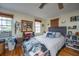 Bright main bedroom with hardwood floors, natural light and decor at 152 Coming St St, Charleston, SC 29403