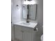 Bathroom vanity with white cabinets, quartz countertop, modern fixtures, and ample storage at 1527 S Pinebark Ln, Charleston, SC 29407