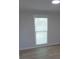 Bedroom with window providing natural light and privacy blinds at 1527 S Pinebark Ln, Charleston, SC 29407