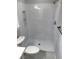 Contemporary all white tiled shower with built in niche and sleek fixtures at 1527 S Pinebark Ln, Charleston, SC 29407