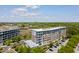 Modern building with lush greenery and parking at 155 Wingo Way # 415, Mount Pleasant, SC 29464