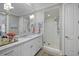 Bright bathroom with a spacious shower, sleek vanity, and modern design for a luxurious feel at 155 Wingo Way # 415, Mount Pleasant, SC 29464
