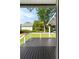 The covered back porch and backyard can be viewed from inside the house at 193 Corn Planters St, Charleston, SC 29492