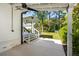 Covered back porch with backyard views and ceiling fan for air circulation at 193 Corn Planters St, Charleston, SC 29492