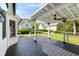 The back porch offers a shady outdoor space and a backyard view at 193 Corn Planters St, Charleston, SC 29492