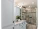 Modern bathroom featuring a glass shower, granite countertop, and stylish fixtures at 193 Corn Planters St, Charleston, SC 29492