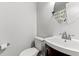 Bright, neutrally painted bathroom with toilet, shower and single sink vanity at 2010 Coldspring Dr # 502, North Charleston, SC 29406