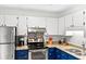 Kitchen showcasing stainless steel appliances, granite countertops and white cabinets at 2010 Coldspring Dr # 502, North Charleston, SC 29406