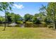 Scenic view of a pond with a fountain feature and lush green landscaping in the neighborhood at 2010 Coldspring Dr # 502, North Charleston, SC 29406
