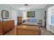 Comfortable bedroom with hardwood floors, ceiling fan, and ample natural light at 2011 N Highway 17 # 1400T, Mount Pleasant, SC 29466