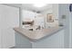 Well-lit kitchen with white cabinetry, modern appliances, and a practical breakfast bar at 2011 N Highway 17 # 1400T, Mount Pleasant, SC 29466