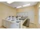 Onsite laundry room with multiple washers, folding space, and convenient access for residents at 2011 N Highway 17 # 1400T, Mount Pleasant, SC 29466