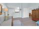 Living room with hardwood floors, a sofa, and an open view to the kitchen at 2011 N Highway 17 # 1400T, Mount Pleasant, SC 29466