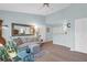 Inviting living room featuring a comfortable sofa, stylish mirror, and hardwood floors at 2011 N Highway 17 # 1400T, Mount Pleasant, SC 29466