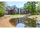 Building overlooking serene pond at 2011 N Highway 17 # 1400T, Mount Pleasant, SC 29466