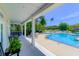 Serene pool area with poolside seating and views of the surrounding landscaped community, inviting you to relax at 2011 N Highway 17 # 1400T, Mount Pleasant, SC 29466