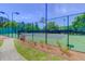 Fenced in community tennis courts ready for a match on a sunny day at 2011 N Highway 17 # 1400T, Mount Pleasant, SC 29466
