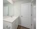 Bright bathroom featuring white cabinets, light countertops, and modern fixtures at 202 W Bradford Pointe Drive Dr, Summerville, SC 29483