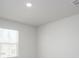 Bright bedroom with a window, neutral walls, and natural light at 202 W Bradford Pointe Drive Dr, Summerville, SC 29483