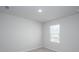 This bedroom has carpet flooring and a large window at 202 W Bradford Pointe Drive Dr, Summerville, SC 29483