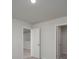 A hallway with two doors that leads to more rooms at 202 W Bradford Pointe Drive Dr, Summerville, SC 29483