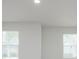 Bright living room with two windows for ample natural light at 202 W Bradford Pointe Drive Dr, Summerville, SC 29483