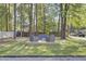 Backyard deck features comfortable seating options and a tranquil outdoor ambiance at 210 Peters St, Summerville, SC 29483