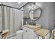 Updated bathroom with new vanity, modern fixtures, and stylish decor at 210 Peters St, Summerville, SC 29483