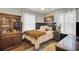 Comfortable bedroom featuring stylish decor, a cozy bed, and warm natural light at 210 Peters St, Summerville, SC 29483