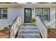Charming front entrance with a painted brick facade and a decorative door at 210 Peters St, Summerville, SC 29483