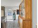 Bright kitchen featuring a black and white tile floor, large cabinets, and stainless steel appliances at 210 Peters St, Summerville, SC 29483