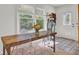 Bright eat-in kitchen with breakfast area, lots of natural light, and decorative tile flooring at 210 Peters St, Summerville, SC 29483