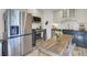 Modern kitchen with stainless steel appliances and custom cabinetry at 210 Peters St, Summerville, SC 29483
