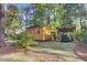 Well-kept shed and a covered golf cart parking area on the property at 210 Peters St, Summerville, SC 29483