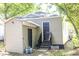 Back of house showing exterior siding and a storage area at 2125 Victory Ave, North Charleston, SC 29405