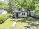 Charming single-story home featuring a cozy front porch and well-maintained lawn at 2125 Victory Ave, North Charleston, SC 29405