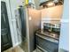 Kitchen with stainless steel appliances and an entry door at 2125 Victory Ave, North Charleston, SC 29405