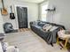 Cozy living room features a black door, guitars hung on the wall, and light gray walls at 2125 Victory Ave, North Charleston, SC 29405