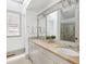 Elegant bathroom showcasing a double vanity, luxurious countertops, and a glass-enclosed shower at 22 Frogmore Rd, Mount Pleasant, SC 29464