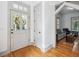 Welcoming foyer with a decorative front door and hardwood floors at 22 Frogmore Rd, Mount Pleasant, SC 29464