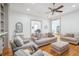 Bright living room with hardwood floors, comfortable seating, and elegant decor at 22 Frogmore Rd, Mount Pleasant, SC 29464