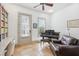Office space with travertine tile floors, piano, and natural light at 22 Frogmore Rd, Mount Pleasant, SC 29464