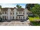 The exterior displays two-story townhouse units with assigned parking and newly installed gutters at 259 Pine Shadow Dr, Goose Creek, SC 29445