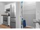 Modern kitchen with stainless steel appliances and attached pantry at 259 Pine Shadow Dr, Goose Creek, SC 29445