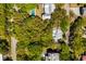 Aerial view showcases the property's location, lush greenery, and nearby amenities at 2808 Ion Ave, Sullivans Island, SC 29482