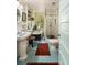 Vintage bathroom boasts pedestal sink, clawfoot tub and standalone shower at 2808 Ion Ave, Sullivans Island, SC 29482